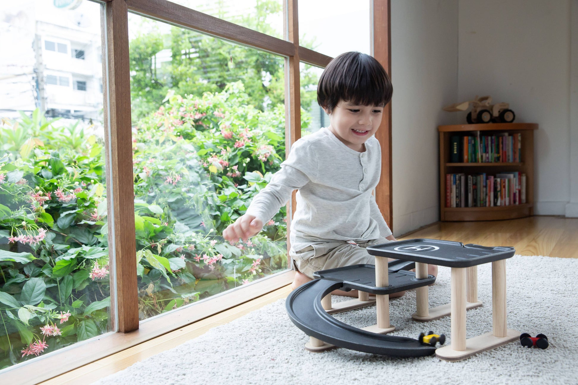 Race and Play Wooden Parking Garage PlanToys - Rose and Friends