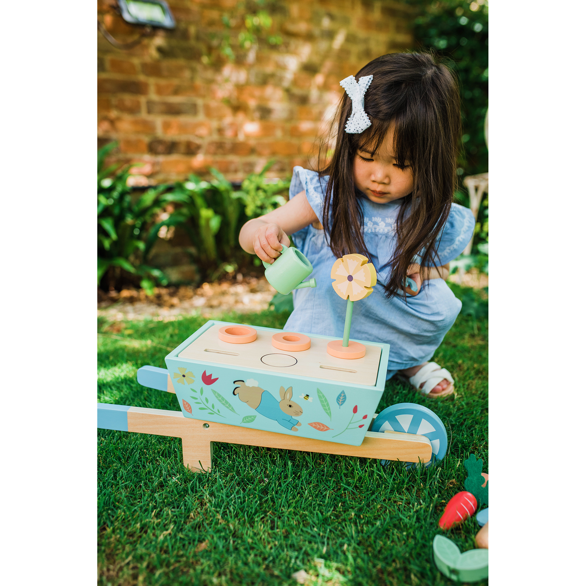 Peter Rabbit™ Wooden Wheelbarrow - Rose and Friends