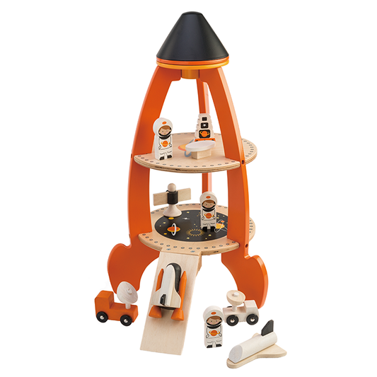 Wooden toy space station with astronauts and vehicles on a white background